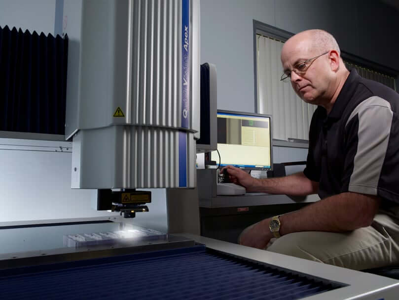 bob_dean_in_qulaity.jpg Rodon employee uses machinery in the facility