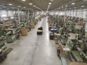 Automated injection molding presses on the production floor at The Rodon Group