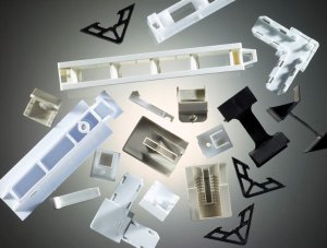 White and black injection molded window and screen hardware components